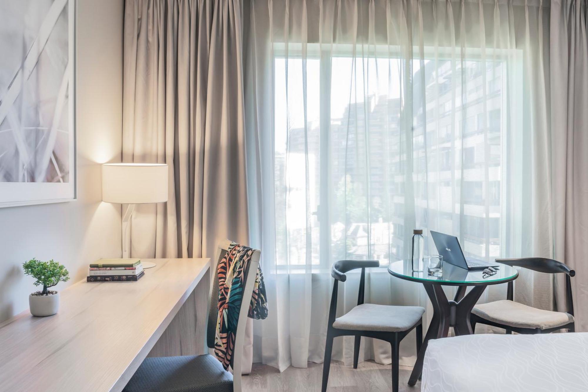 Pullman Santiago Vitacura エクステリア 写真 A room at the hotel